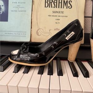 CHANEL Black Patent Heels with Cream Trim